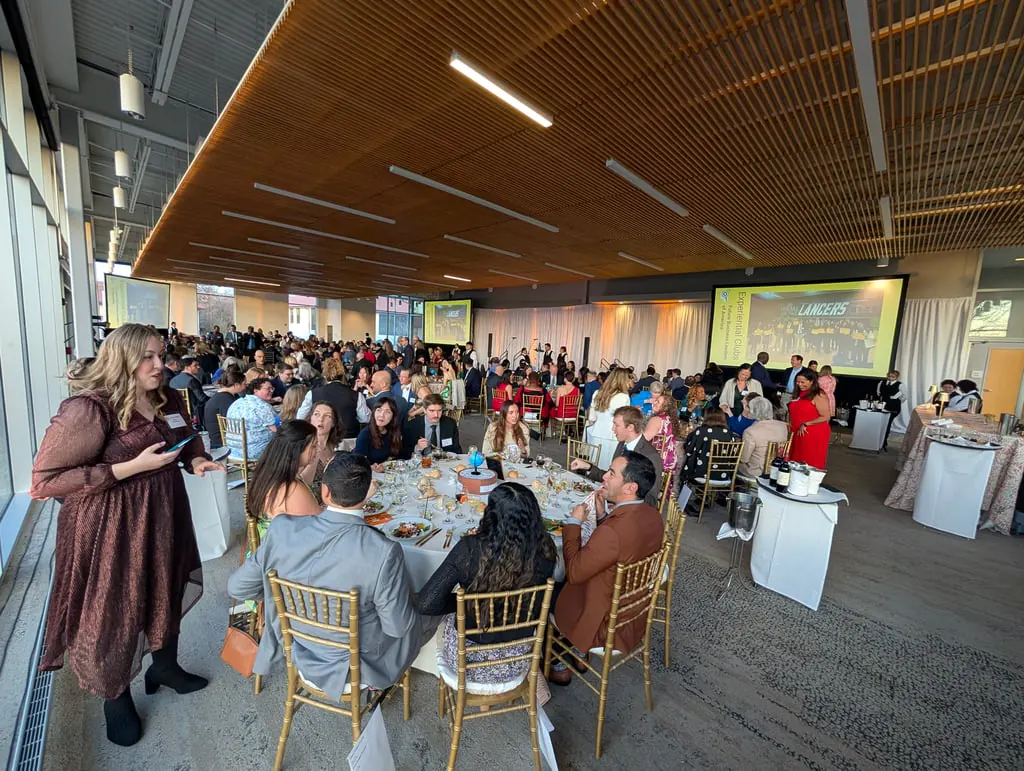 A banquet hall filled with guests at the Lake Forest Academy fundraising gala